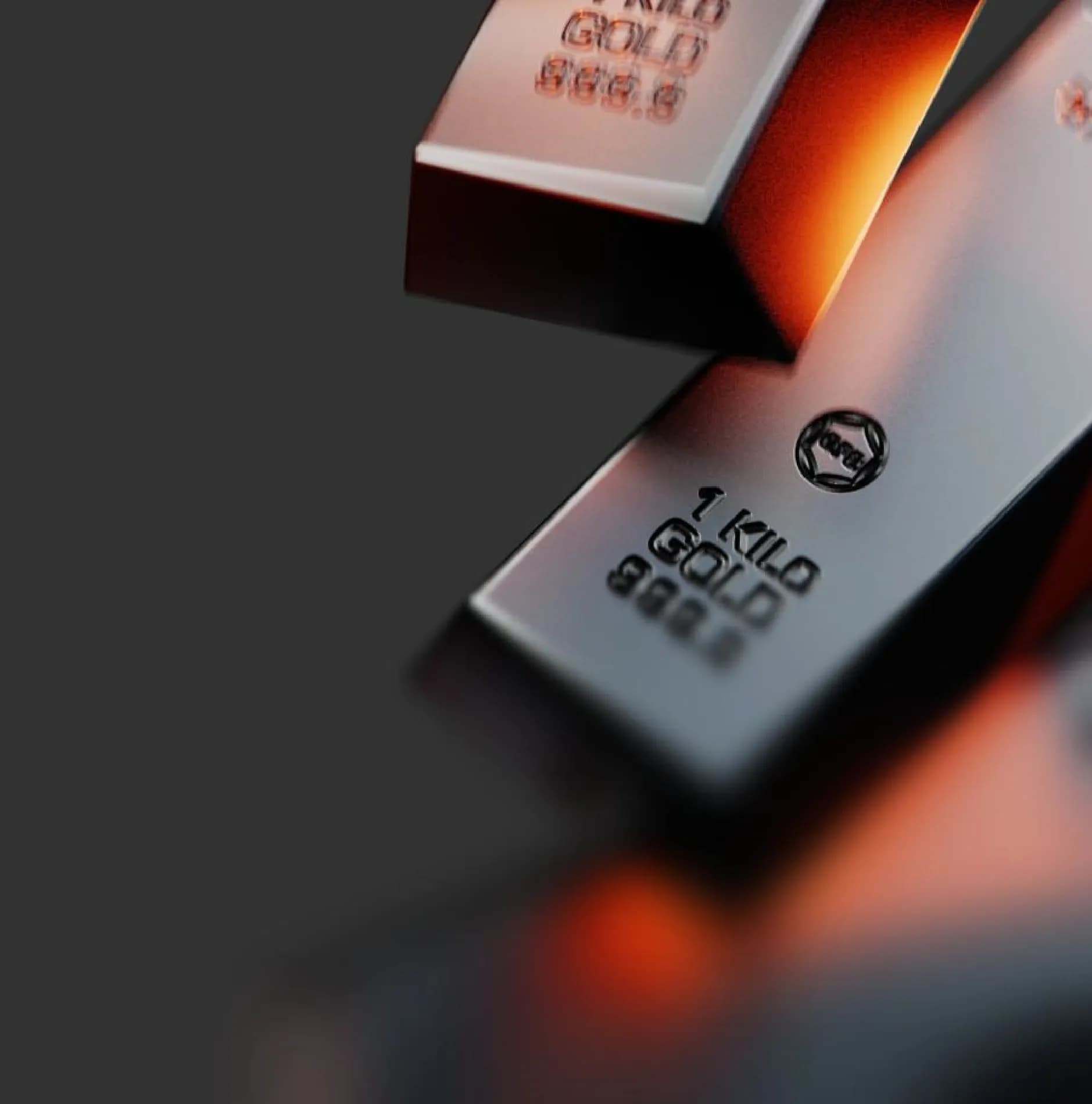 Two silver-colored 1 kilo gold bars with "GOLD 999.9" engraved, on a dark background.