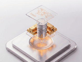 Gold bars support a glowing digital circuit on a futuristic metallic platform.
